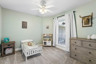 Situated on a spacious double lot in the desirable Diamondhead on Diamondhead Country Club in Mississippi - for sale on GolfHomes.com, golf home, golf lot