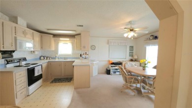 1996 MOBILE HOME IN ACTIVE 55+ COMMUNITY. FURNISHED one bedroom on River Run Golf Links in Florida - for sale on GolfHomes.com, golf home, golf lot