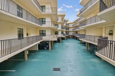 Experience island living at its finest! This spacious 2/2 condo on Ocean Club At the Hutchinson Island Beach Resort in Florida - for sale on GolfHomes.com, golf home, golf lot