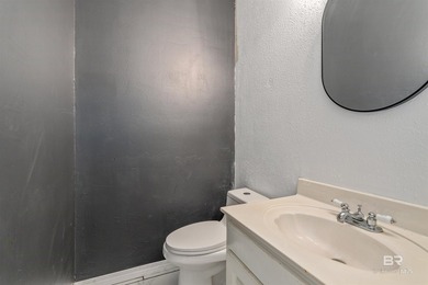 2,444 square feet with a fortified roof (2022) and new HVAC at on Lake Forest Yacht and Country Club in Alabama - for sale on GolfHomes.com, golf home, golf lot