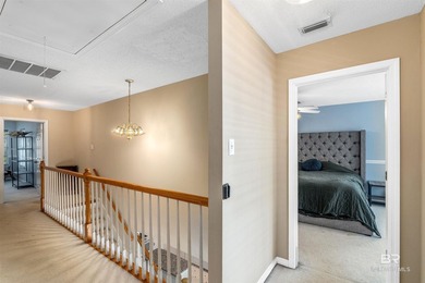 2,444 square feet with a fortified roof (2022) and new HVAC at on Lake Forest Yacht and Country Club in Alabama - for sale on GolfHomes.com, golf home, golf lot