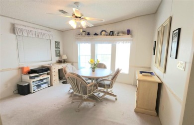 1996 MOBILE HOME IN ACTIVE 55+ COMMUNITY. FURNISHED one bedroom on River Run Golf Links in Florida - for sale on GolfHomes.com, golf home, golf lot