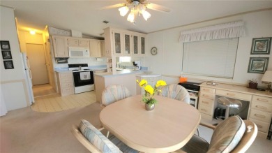 1996 MOBILE HOME IN ACTIVE 55+ COMMUNITY. FURNISHED one bedroom on River Run Golf Links in Florida - for sale on GolfHomes.com, golf home, golf lot