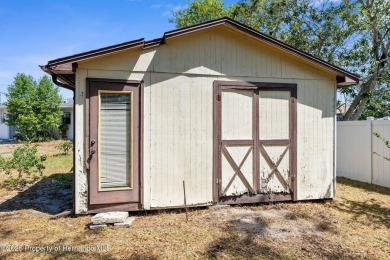 Welcome home to this charming and METICULOUSLY maintained on Oak Hills Country Club in Florida - for sale on GolfHomes.com, golf home, golf lot