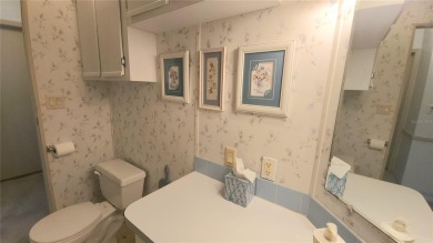 1996 MOBILE HOME IN ACTIVE 55+ COMMUNITY. FURNISHED one bedroom on River Run Golf Links in Florida - for sale on GolfHomes.com, golf home, golf lot