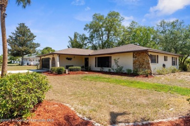 Welcome home to this charming and METICULOUSLY maintained on Oak Hills Country Club in Florida - for sale on GolfHomes.com, golf home, golf lot