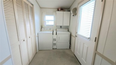 1996 MOBILE HOME IN ACTIVE 55+ COMMUNITY. FURNISHED one bedroom on River Run Golf Links in Florida - for sale on GolfHomes.com, golf home, golf lot