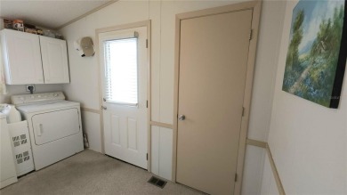 1996 MOBILE HOME IN ACTIVE 55+ COMMUNITY. FURNISHED one bedroom on River Run Golf Links in Florida - for sale on GolfHomes.com, golf home, golf lot
