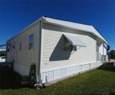 1996 MOBILE HOME IN ACTIVE 55+ COMMUNITY. FURNISHED one bedroom on River Run Golf Links in Florida - for sale on GolfHomes.com, golf home, golf lot