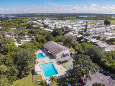 1996 MOBILE HOME IN ACTIVE 55+ COMMUNITY. FURNISHED one bedroom on River Run Golf Links in Florida - for sale on GolfHomes.com, golf home, golf lot
