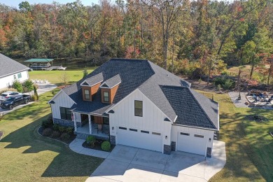 Welcome to this exceptional lakefront residence in the exclusive on The Links At Stoney Point in South Carolina - for sale on GolfHomes.com, golf home, golf lot