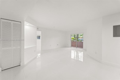 Resort-Style Living in the Heart of Doral. Light-filled  move-in on Jim McLean Signature Course in Florida - for sale on GolfHomes.com, golf home, golf lot