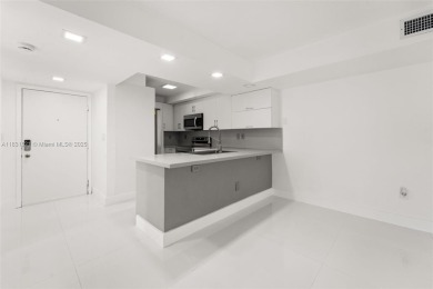 Resort-Style Living in the Heart of Doral. Light-filled  move-in on Jim McLean Signature Course in Florida - for sale on GolfHomes.com, golf home, golf lot