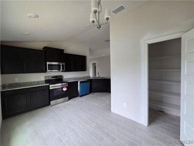 SELLER PROMO ON THIS POPULAR 1820 PLAN ON A CUL DE SAC IN A on Twisted Oaks Golf Club in Florida - for sale on GolfHomes.com, golf home, golf lot