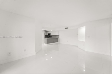 Resort-Style Living in the Heart of Doral. Light-filled  move-in on Jim McLean Signature Course in Florida - for sale on GolfHomes.com, golf home, golf lot