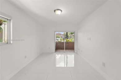 Resort-Style Living in the Heart of Doral. Light-filled  move-in on Jim McLean Signature Course in Florida - for sale on GolfHomes.com, golf home, golf lot