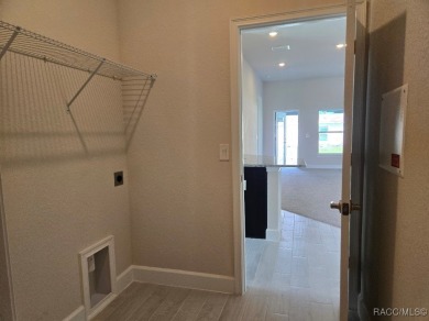 The 1820 plan is available in a cul-de-sac location within a on Twisted Oaks Golf Club in Florida - for sale on GolfHomes.com, golf home, golf lot