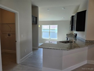 The 1820 plan is available in a cul-de-sac location within a on Twisted Oaks Golf Club in Florida - for sale on GolfHomes.com, golf home, golf lot