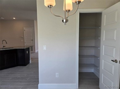 The 1820 plan is available in a cul-de-sac location within a on Twisted Oaks Golf Club in Florida - for sale on GolfHomes.com, golf home, golf lot