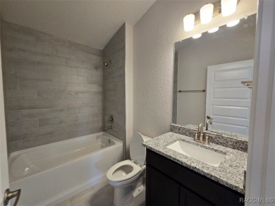The 1820 plan is available in a cul-de-sac location within a on Twisted Oaks Golf Club in Florida - for sale on GolfHomes.com, golf home, golf lot
