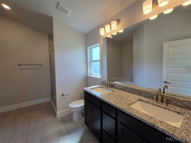 The 1820 plan is available in a cul-de-sac location within a on Twisted Oaks Golf Club in Florida - for sale on GolfHomes.com, golf home, golf lot
