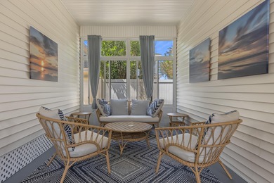 Welcome to this unique Florida Victorian style cottage, a on Regatta Bay Golf and Country Club in Florida - for sale on GolfHomes.com, golf home, golf lot