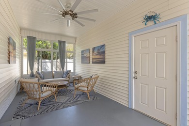 Welcome to this unique Florida Victorian style cottage, a on Regatta Bay Golf and Country Club in Florida - for sale on GolfHomes.com, golf home, golf lot