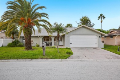 Welcome to your slice of paradise in the GOLF-CART friendly on Gulf Harbors Golf Course in Florida - for sale on GolfHomes.com, golf home, golf lot