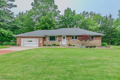 This charming brick ranch offers comfort, privacy, and a unique on Airport Greens Golf Club in Ohio - for sale on GolfHomes.com, golf home, golf lot