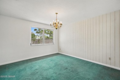 Located in an established neighborhood near the New Smyrna Beach on New Smyrna Beach Golf Course in Florida - for sale on GolfHomes.com, golf home, golf lot