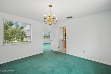 Located in an established neighborhood near the New Smyrna Beach on New Smyrna Beach Golf Course in Florida - for sale on GolfHomes.com, golf home, golf lot