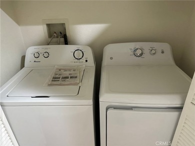 Great view! two-story of La Vista condo with dual master suites on El Niguel Country Club in California - for sale on GolfHomes.com, golf home, golf lot