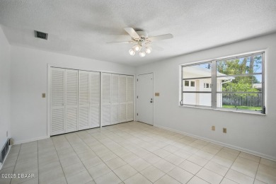 Located in an established neighborhood near the New Smyrna Beach on New Smyrna Beach Golf Course in Florida - for sale on GolfHomes.com, golf home, golf lot