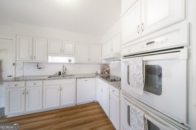 Welcome to 300 Woodchuck Court, ideally located in the on Horseshoe Bend Country Club in Georgia - for sale on GolfHomes.com, golf home, golf lot