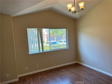 Great view! two-story of La Vista condo with dual master suites on El Niguel Country Club in California - for sale on GolfHomes.com, golf home, golf lot