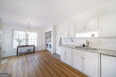 Welcome to 300 Woodchuck Court, ideally located in the on Horseshoe Bend Country Club in Georgia - for sale on GolfHomes.com, golf home, golf lot