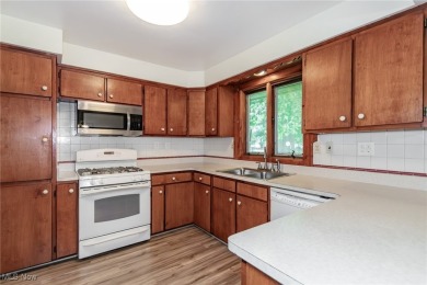 This charming brick ranch offers comfort, privacy, and a unique on Airport Greens Golf Club in Ohio - for sale on GolfHomes.com, golf home, golf lot