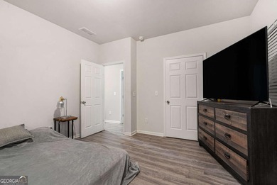 Welcome to this beautiful modern ranch-style home in the on Turtle Cove Golf Course in Georgia - for sale on GolfHomes.com, golf home, golf lot