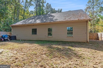Welcome to this beautiful modern ranch-style home in the on Turtle Cove Golf Course in Georgia - for sale on GolfHomes.com, golf home, golf lot
