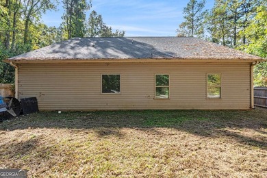 Welcome to this beautiful modern ranch-style home in the on Turtle Cove Golf Course in Georgia - for sale on GolfHomes.com, golf home, golf lot