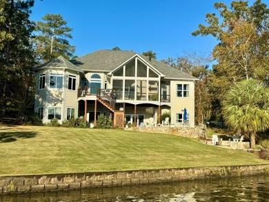 OUTSTANDING ARCHITECTURAL MASTERPIECE IN THE PLANTATION - THE on The Patriot Golf Club At Grand Harbor in South Carolina - for sale on GolfHomes.com, golf home, golf lot