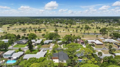 Located in an established neighborhood near the New Smyrna Beach on New Smyrna Beach Golf Course in Florida - for sale on GolfHomes.com, golf home, golf lot