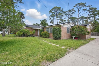 Located in an established neighborhood near the New Smyrna Beach on New Smyrna Beach Golf Course in Florida - for sale on GolfHomes.com, golf home, golf lot