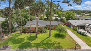 Located in an established neighborhood near the New Smyrna Beach on New Smyrna Beach Golf Course in Florida - for sale on GolfHomes.com, golf home, golf lot