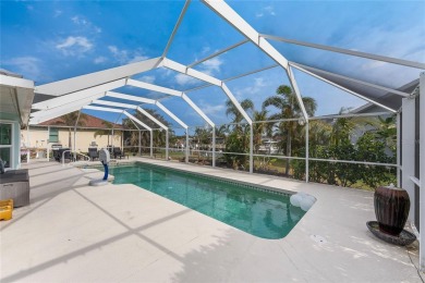 Impressive WATERFRONT pool home with EXPANSIVE WATER VIEW on Saint Andrews South Golf Club in Florida - for sale on GolfHomes.com, golf home, golf lot