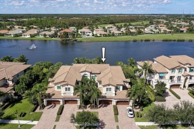 This highly upgraded carriage home in Jupiter Country Club on Jupiter Country Club in Florida - for sale on GolfHomes.com, golf home, golf lot