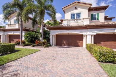 This highly upgraded carriage home in Jupiter Country Club on Jupiter Country Club in Florida - for sale on GolfHomes.com, golf home, golf lot