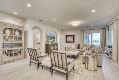 This highly upgraded carriage home in Jupiter Country Club on Jupiter Country Club in Florida - for sale on GolfHomes.com, golf home, golf lot