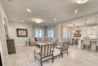 This highly upgraded carriage home in Jupiter Country Club on Jupiter Country Club in Florida - for sale on GolfHomes.com, golf home, golf lot