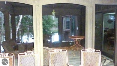 This home in the attractive Michabou Shores Subdivision is about on Crystal Downs Country Club in Michigan - for sale on GolfHomes.com, golf home, golf lot